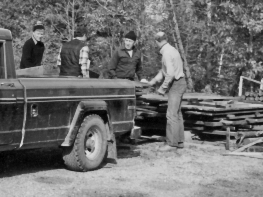 Club members relocate donated heritage log cabin to Murphys Point Park, 1983.