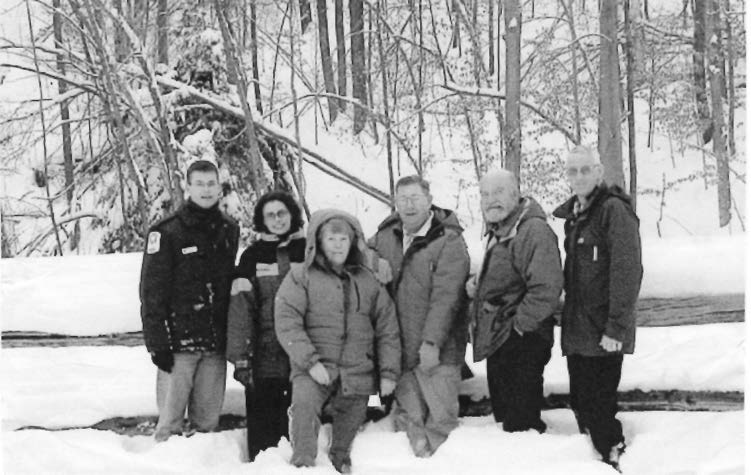Concerted effort results in Ski Fest 2000 at MPPP. Volunteer organizers from Park Staff, Friends of the Park and the Club, pause for photo break.