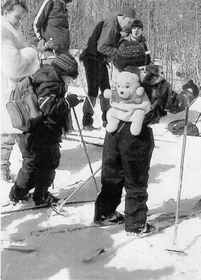 Orion Clark and Pat Bowles muster the Bunny Rabbits and Winnie the Pooh for fun in the snow.