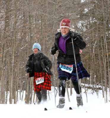 Kilted Skiers Brian Rauwerda and Kandice Brown